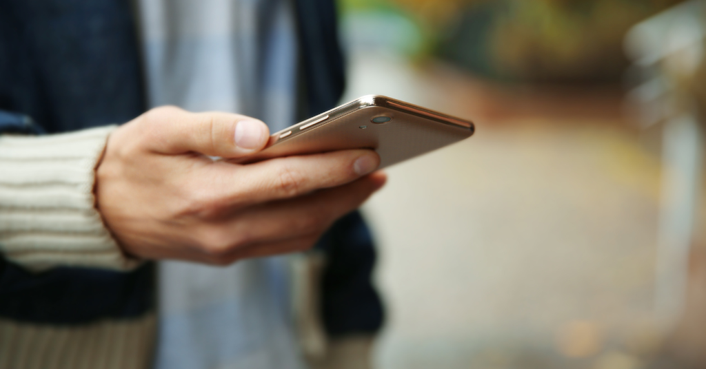 Man holding cell phone