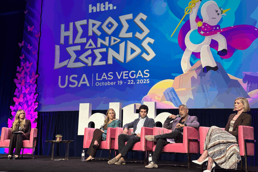 Anand Iyer speaking on stage at HLTH.